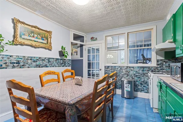 a view of backyard with plants and trees