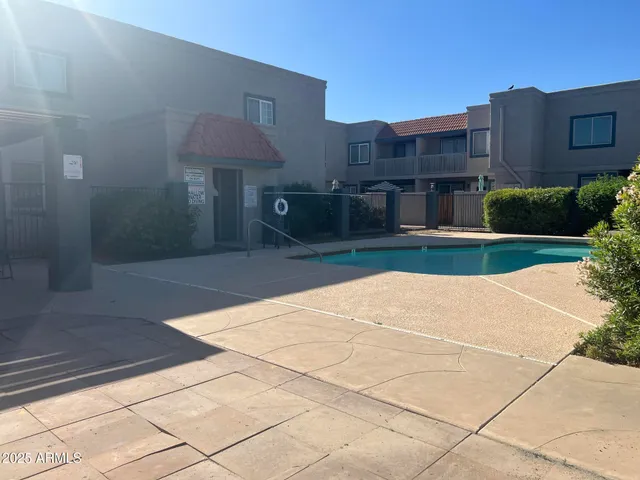 a house view with a backyard space