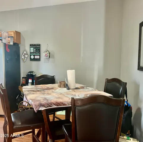 a bedroom with a bed and a table in it