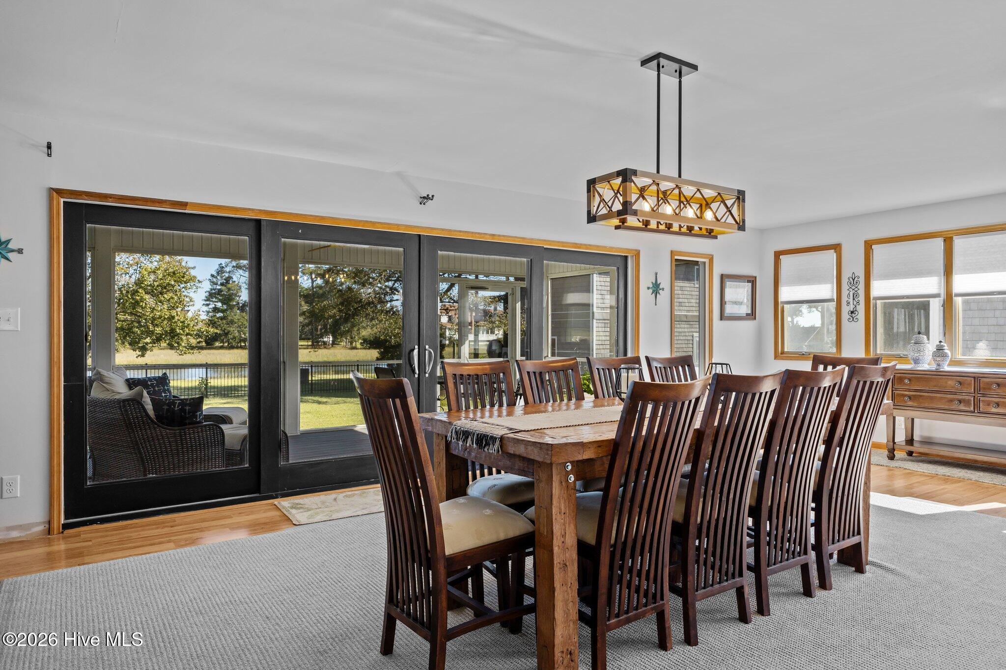 180 Wallace Road Beaufort, NC 28516 - Photo 19 of 45 Dining room with window views of the back yard and water canal