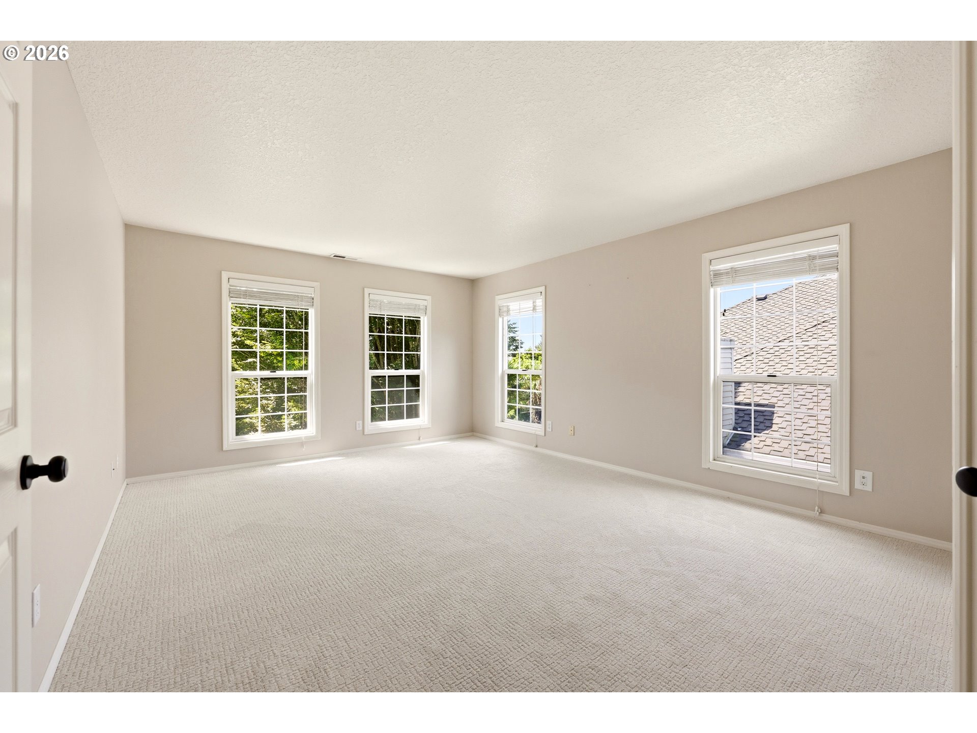 5807 Ridgetop Court Lake Oswego, OR 97035 - Photo 23 of 42 a view of an empty room with a window