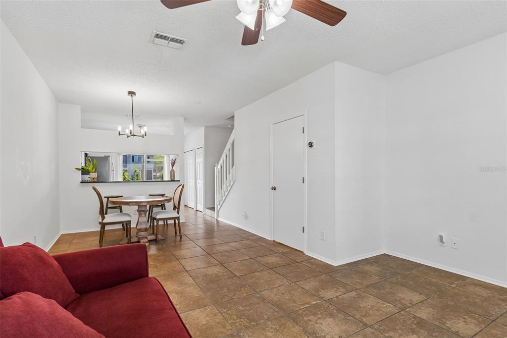 382 Countryside Key Boulevard Oldsmar, FL 34677 - Photo 7 of 58 a workspace with furniture and window
