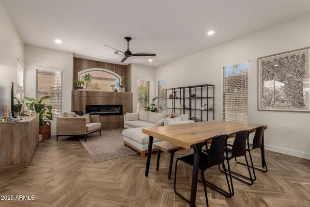 a view of a dining room with furniture window and wooden floor