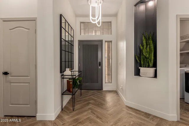 a view of hall way with mirror