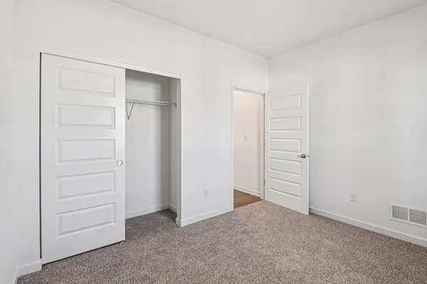 an empty room with closet