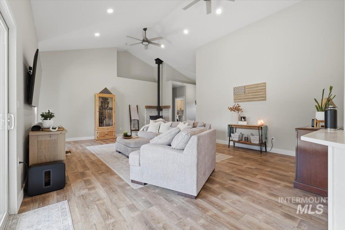 11650 Willis Road Middleton, ID 83644 - Photo 9 of 31 Vaulted ceiling with recessed lighting and ceiling fans