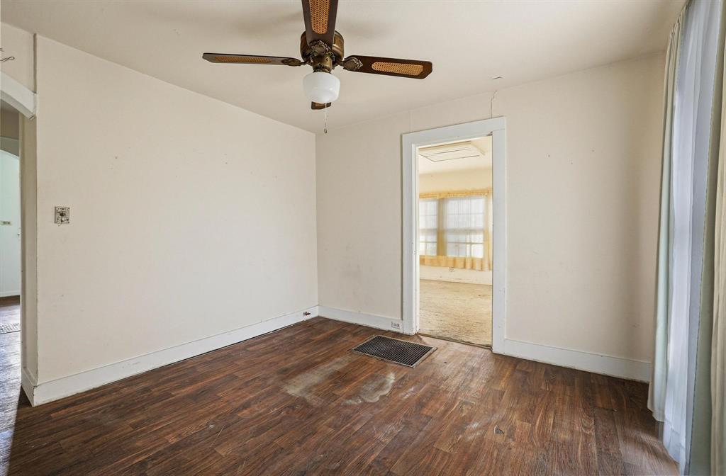 421 East Hull Street Denison, TX 75021 - Photo 12 of 33 wooden floor in an empty room