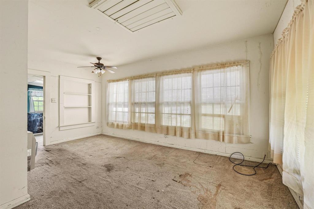 421 East Hull Street Denison, TX 75021 - Photo 19 of 33 a view of an empty room with a window