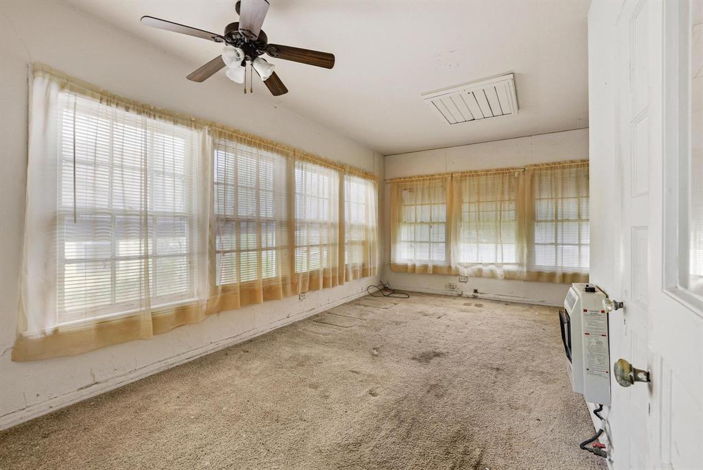 421 East Hull Street Denison, TX 75021 - Photo 21 of 33 a view of an empty room with a window