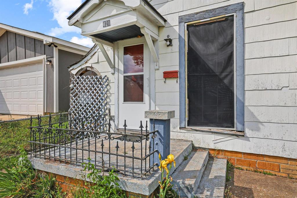 421 East Hull Street Denison, TX 75021 - Photo 5 of 33 a view of an outdoor space
