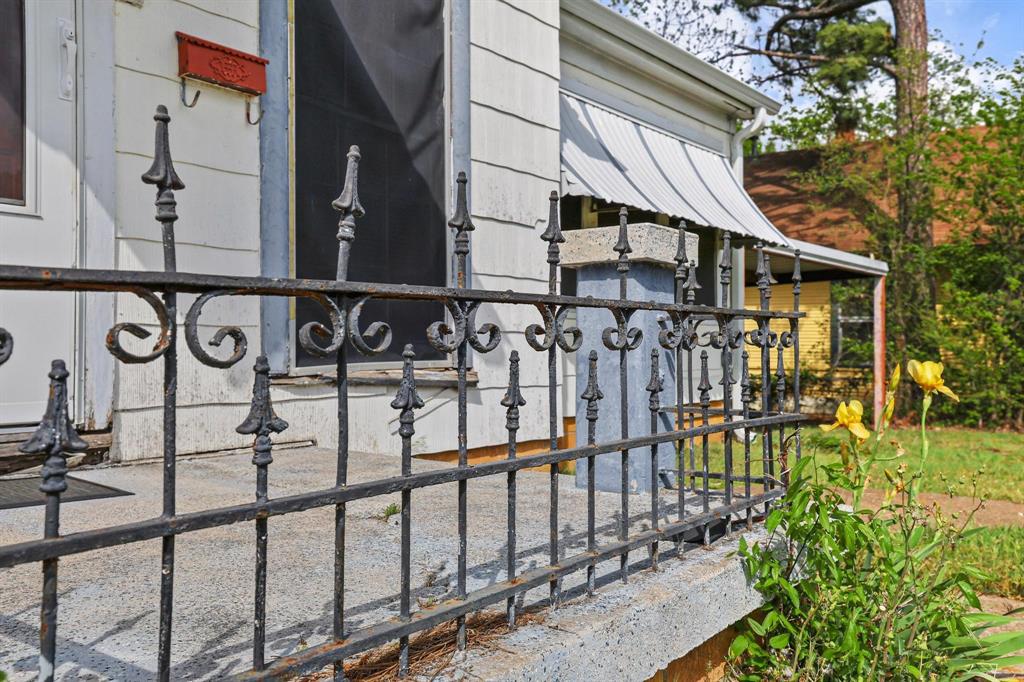 421 East Hull Street Denison, TX 75021 - Photo 7 of 33 a view of a brick house with many windows