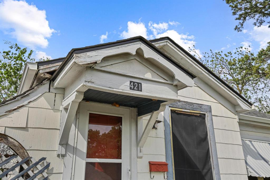 421 East Hull Street Denison, TX 75021 - Photo 8 of 33 a view of a house with a large window