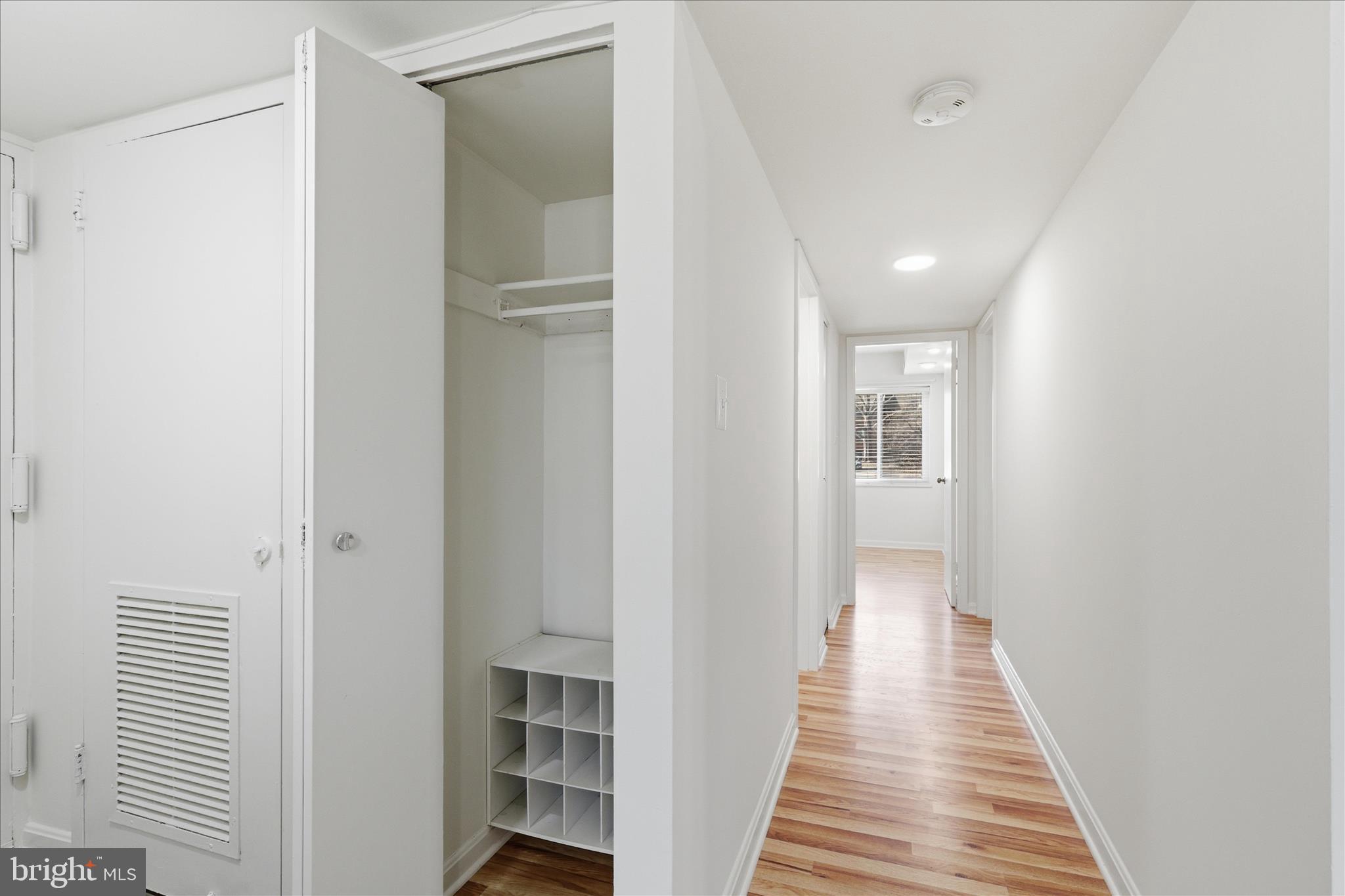 1433 Northgate Square, Unit 11B Reston, VA 20190 - Photo 15 of 44 a view of a hallway with wooden floor and entryway