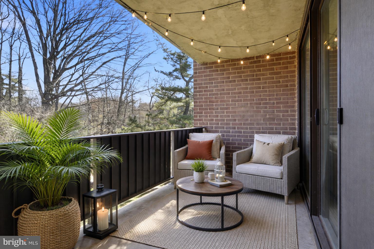 1433 Northgate Square, Unit 11B Reston, VA 20190 - Photo 22 of 44 a outdoor living space with furniture and a potted plant