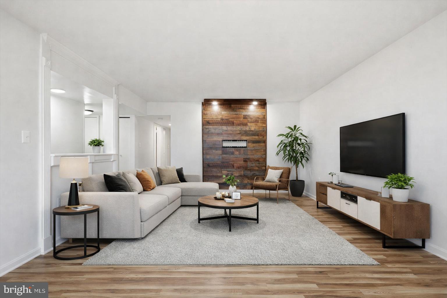 1433 Northgate Square, Unit 11B Reston, VA 20190 - Photo 9 of 44 a living room with furniture and a flat screen tv