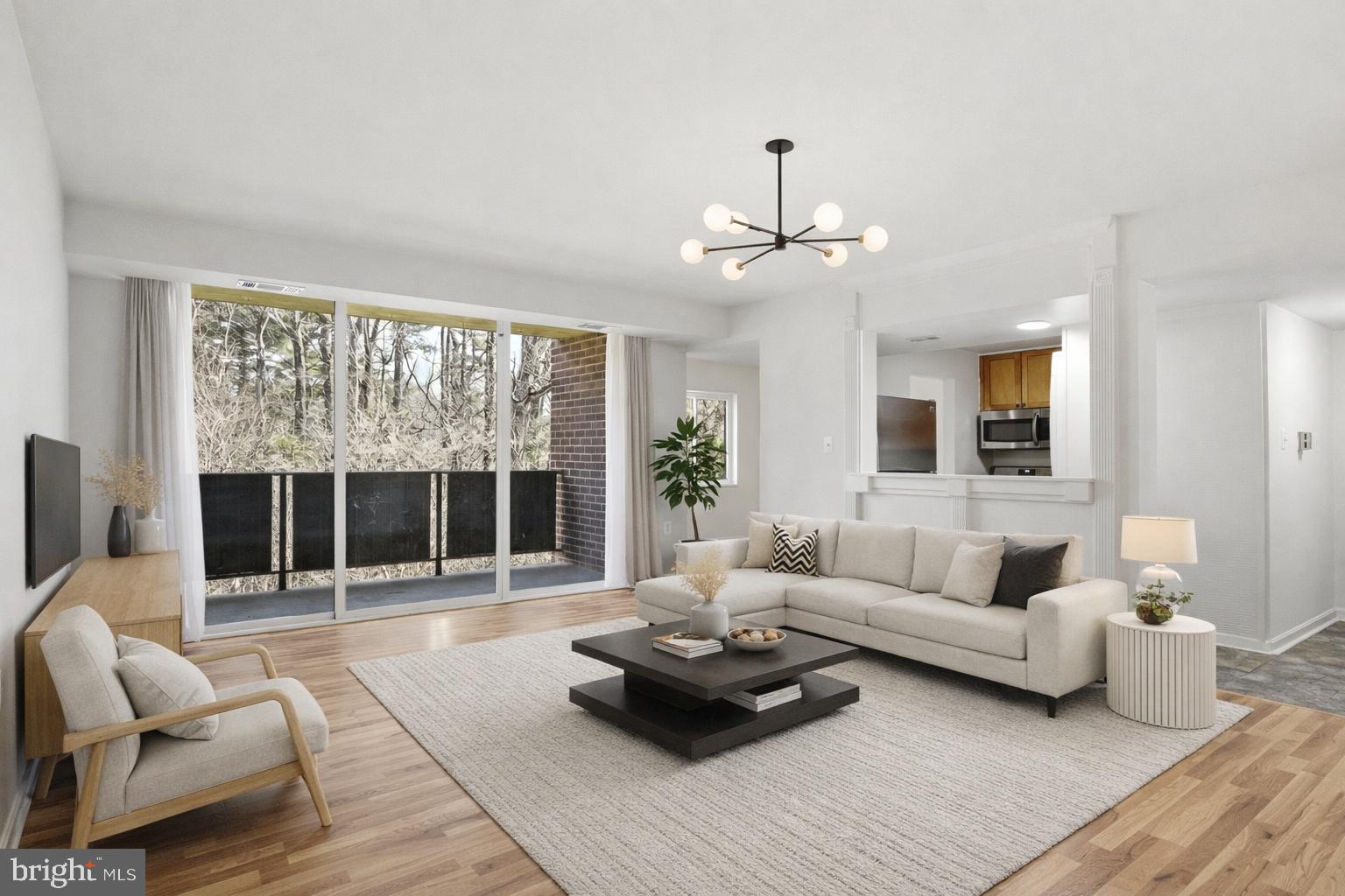 1433 Northgate Square, Unit 11B Reston, VA 20190 - Photo 10 of 44 a living room with furniture and a large window