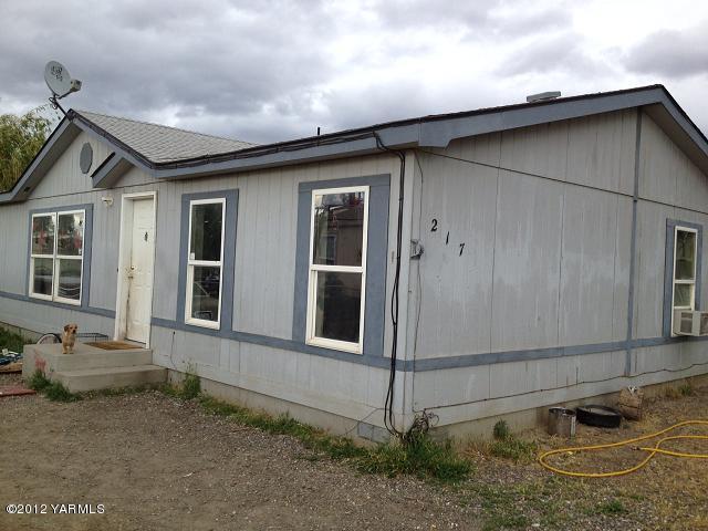 217 Maple Street Mabton, WA 98935 - Photo 1 of 1 a backyard of a house