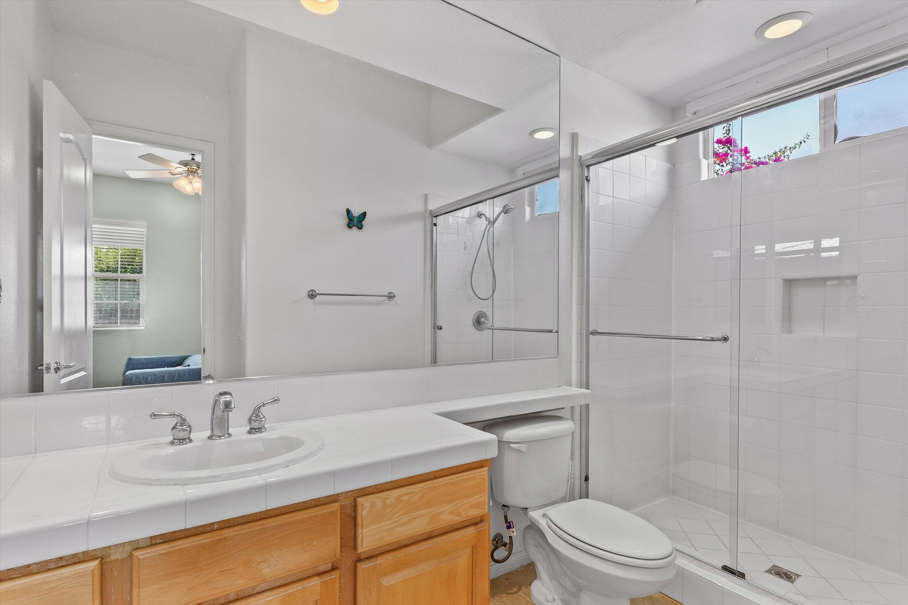 27 Via Del Maricale Rancho Mirage, CA 92270 - Photo 20 of 52 a bathroom with a sink a toilet and shower