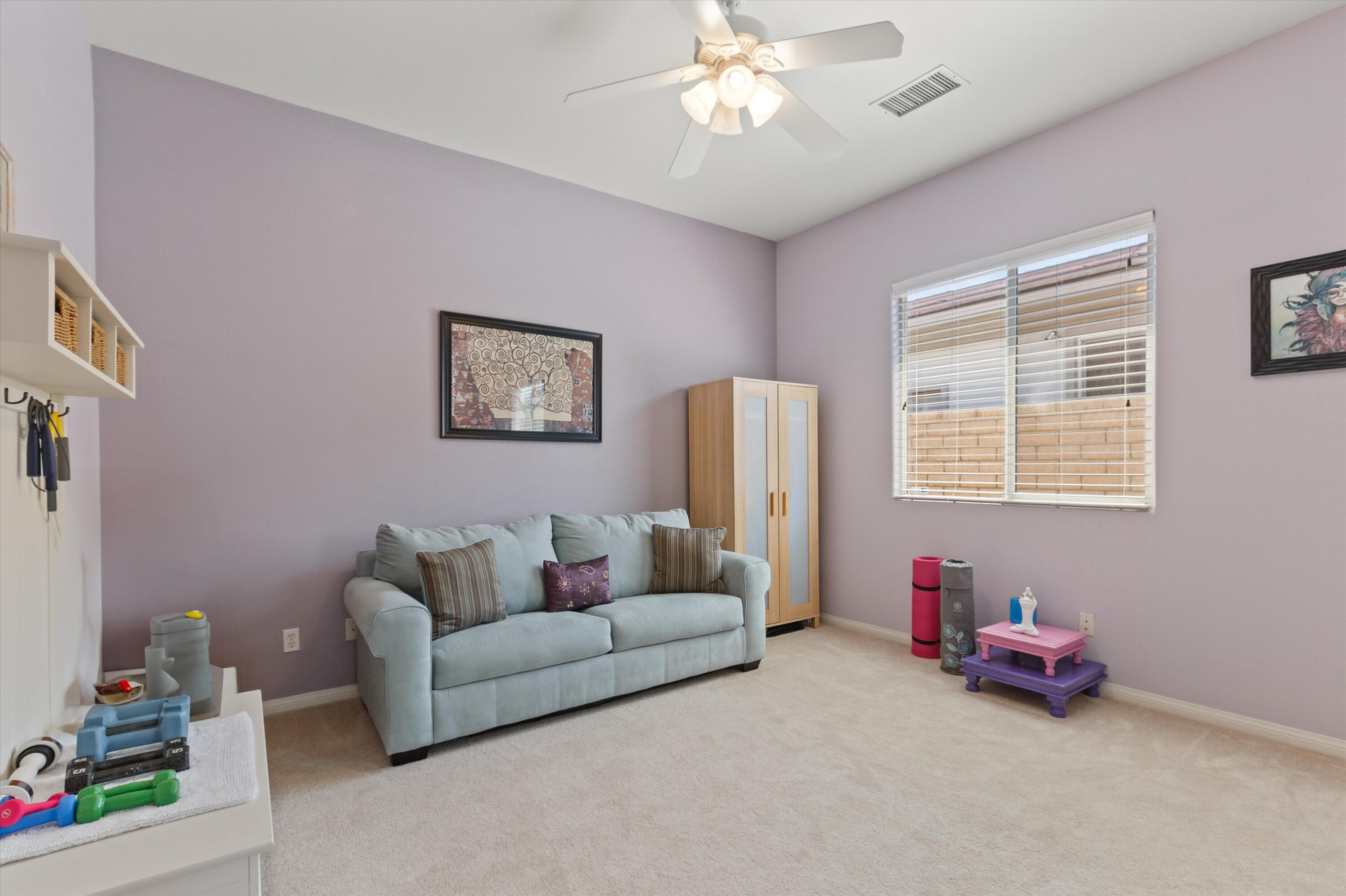 27 Via Del Maricale Rancho Mirage, CA 92270 - Photo 22 of 52 a living room with furniture and a window