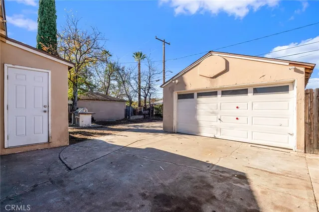 a view of a house with a garage