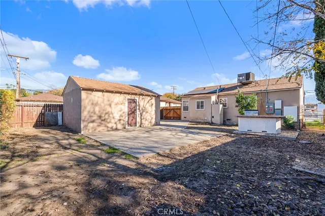 a house view with a backyard space