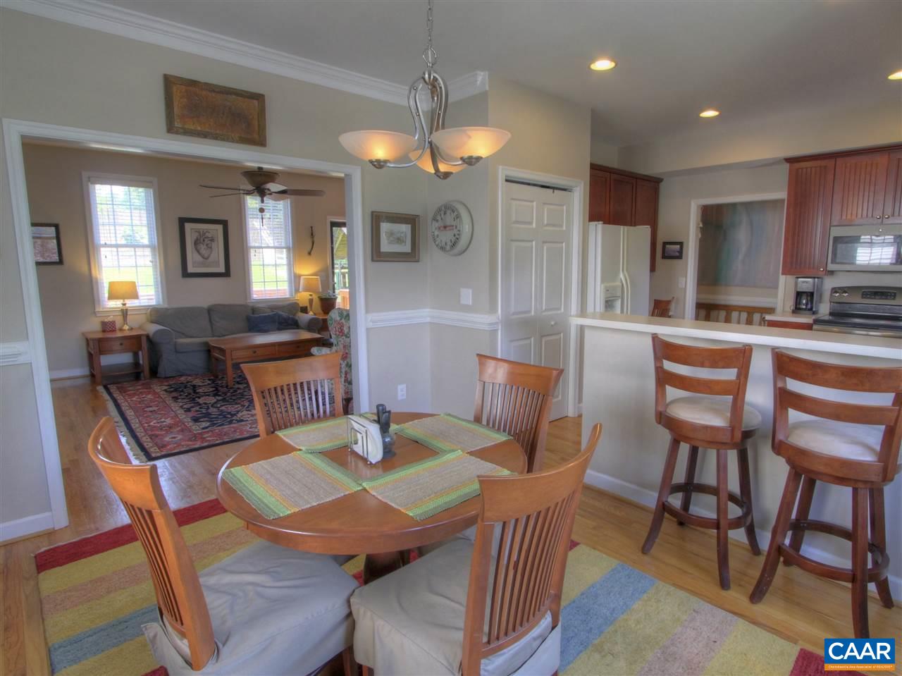 1275 Amber Ridge Road Charlottesville, VA 22901 - Photo 14 of 28 a view of a dining room with furniture