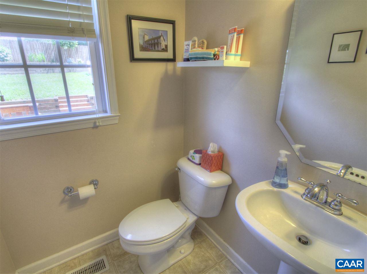 1275 Amber Ridge Road Charlottesville, VA 22901 - Photo 15 of 28 a bathroom with a toilet sink and mirror