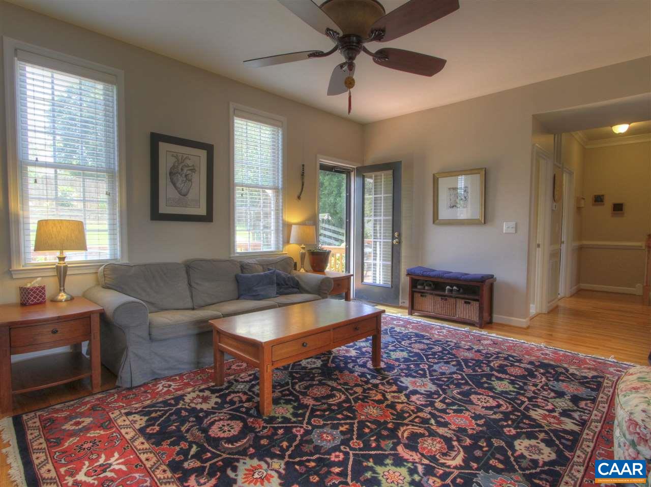 1275 Amber Ridge Road Charlottesville, VA 22901 - Photo 6 of 28 a living room with furniture and a rug