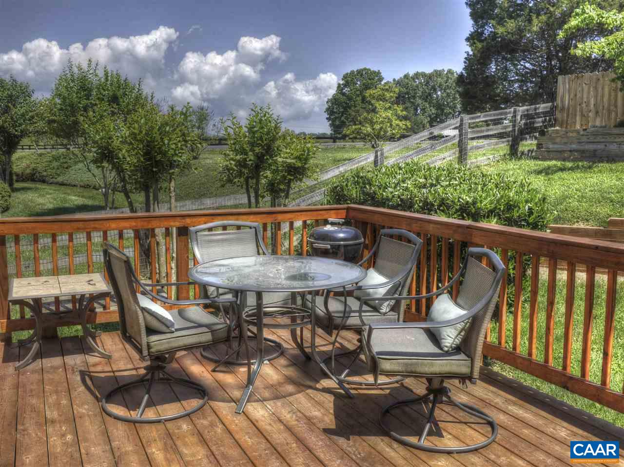 1275 Amber Ridge Road Charlottesville, VA 22901 - Photo 7 of 28 a view of balcony with wooden floor and outdoor seating