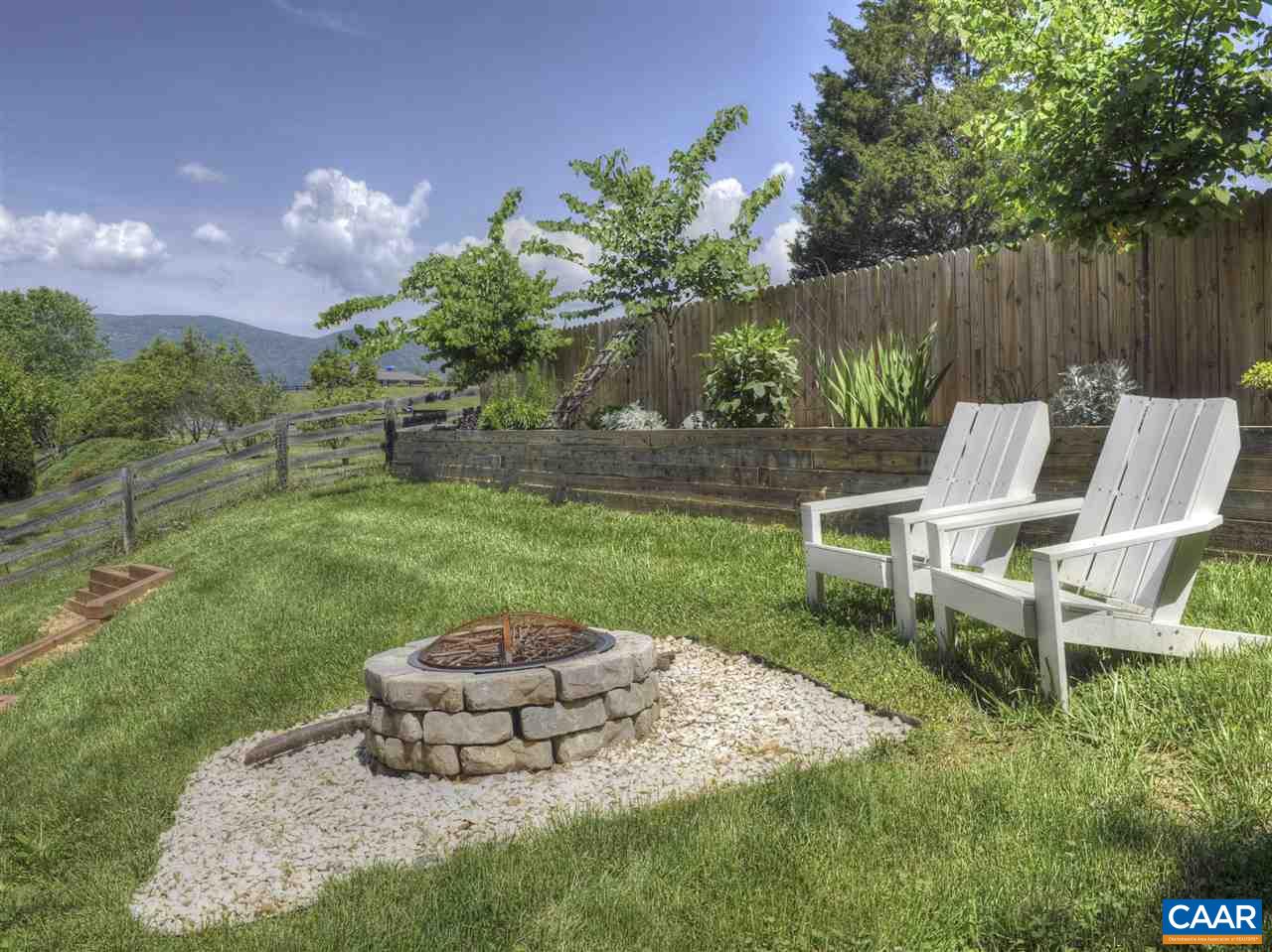 1275 Amber Ridge Road Charlottesville, VA 22901 - Photo 8 of 28 a view of a chair and table of the garden