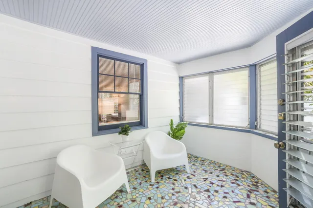 a living room with a couch and a table