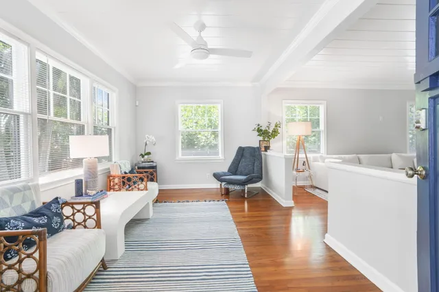 a living room with furniture and a table