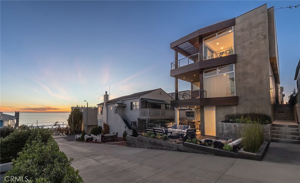 121 16th Street Manhattan Beach, CA 90266 - Photo 1 of 39 a front view of a building with sitting area