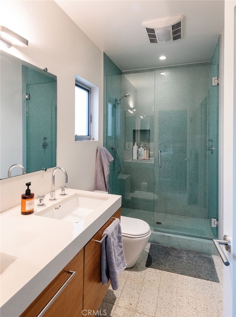 121 16th Street Manhattan Beach, CA 90266 - Photo 23 of 39 a bathroom with a sink toilet and shower