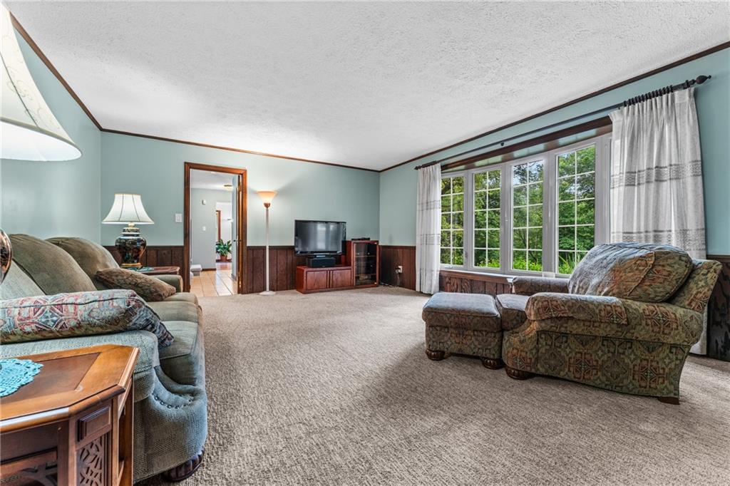 171 East Airport Road Butler, PA 16002 - Photo 21 of 47 a living room with furniture and a large window