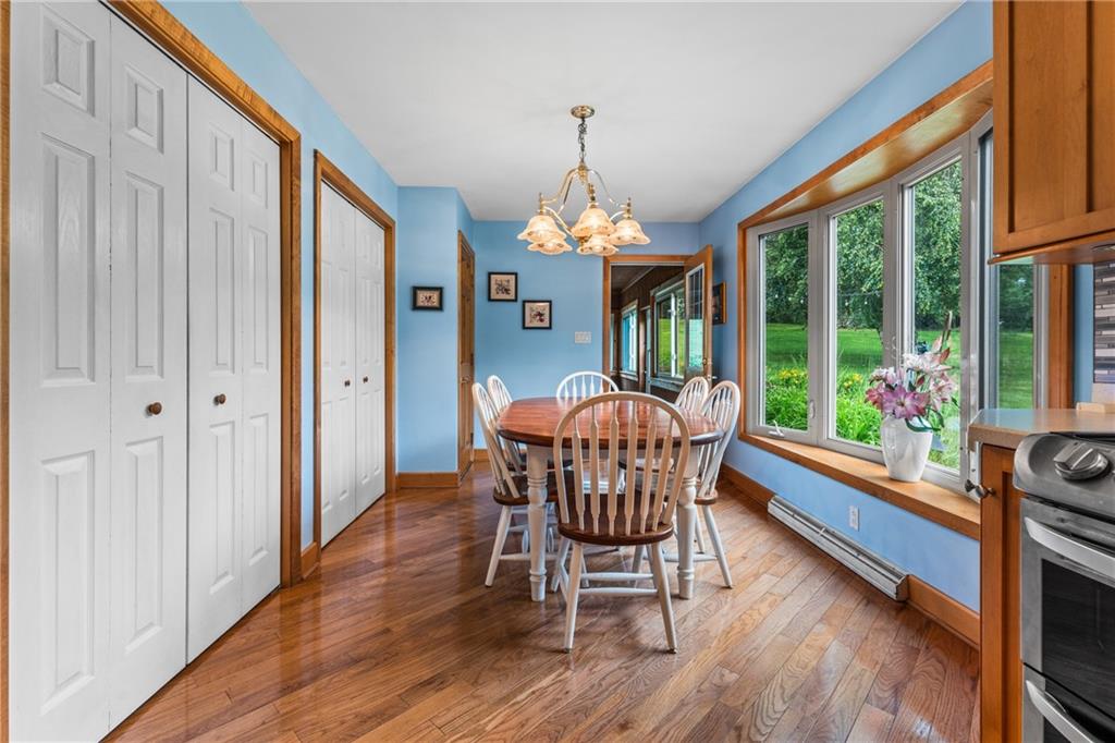 171 East Airport Road Butler, PA 16002 - Photo 25 of 47 a dining room with furniture window and wooden floor