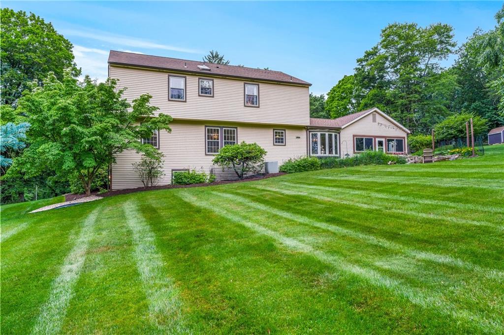 171 East Airport Road Butler, PA 16002 - Photo 6 of 47 a front view of a house with a yard and trees