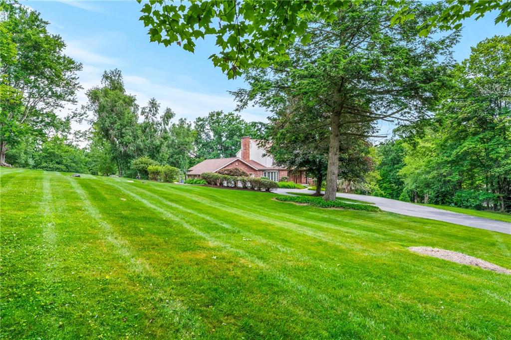 171 East Airport Road Butler, PA 16002 - Photo 9 of 47 a view of a house with a yard and sitting area