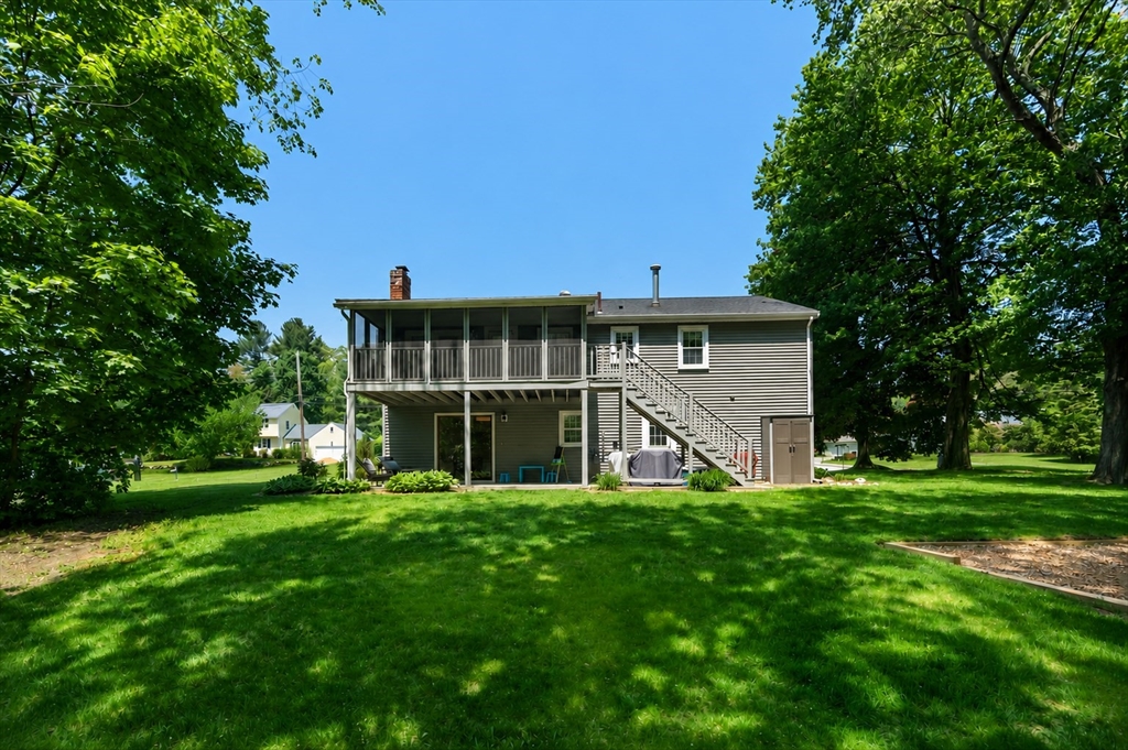 11 Longmeadow Road Medfield, MA 02052 - Photo 30 of 39 a view of a house with a yard and sitting area