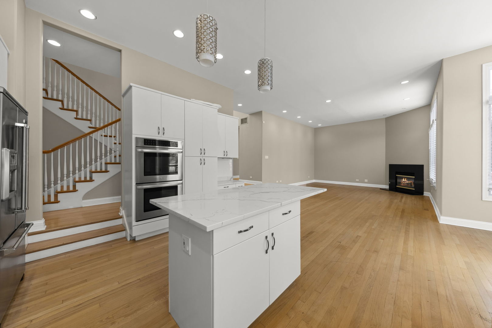 1663 Pebble Beach Way Vernon Hills, IL 60061 - Photo 13 of 40 a view of kitchen with cabinets and wooden floor