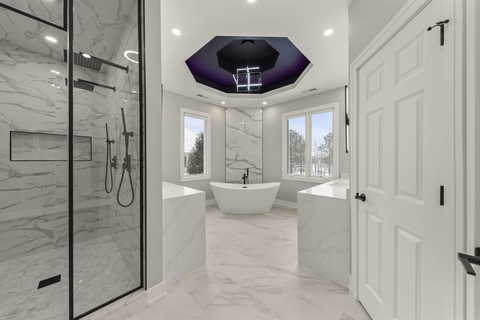 1663 Pebble Beach Way Vernon Hills, IL 60061 - Photo 24 of 40 a spacious bathroom with a mirror and a glass shower door