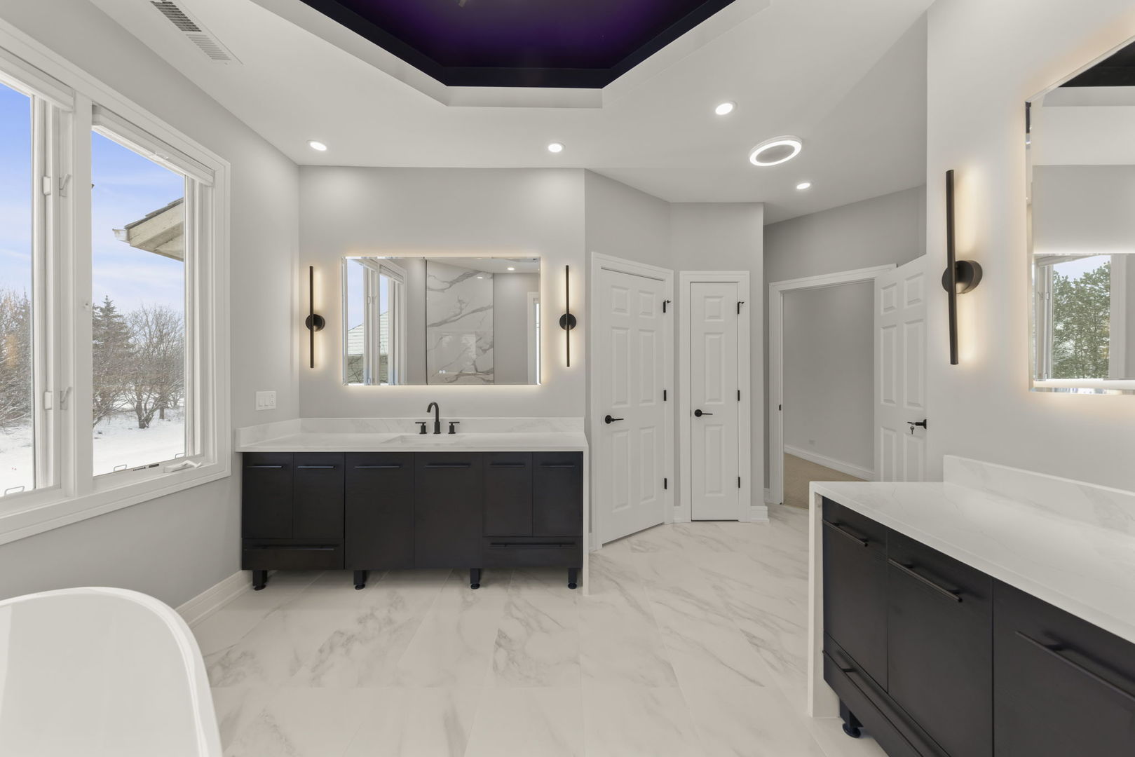 1663 Pebble Beach Way Vernon Hills, IL 60061 - Photo 26 of 40 a spacious bathroom with a tub sink and mirror