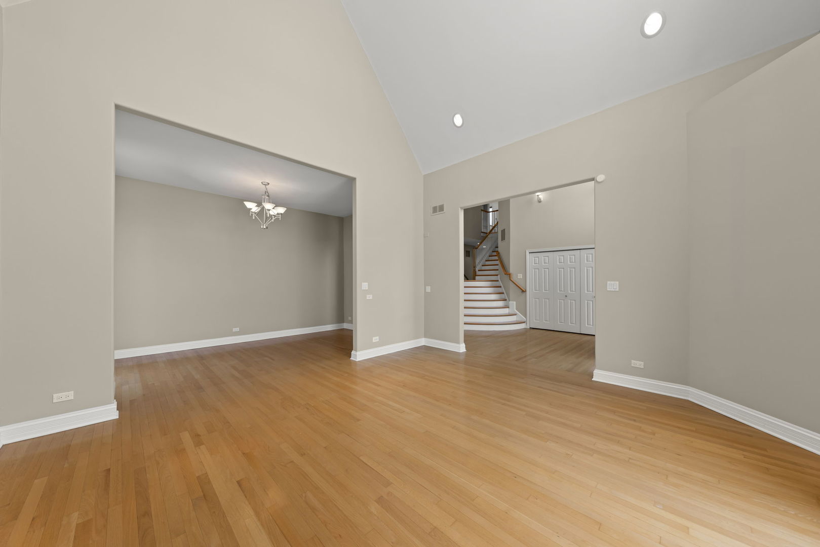 1663 Pebble Beach Way Vernon Hills, IL 60061 - Photo 5 of 40 a view of an empty room with wooden floor and closet