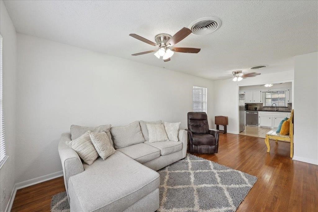 253 Hampton Lane Beaumont, TX 77707 - Photo 3 of 33 a living room with furniture and kitchen view