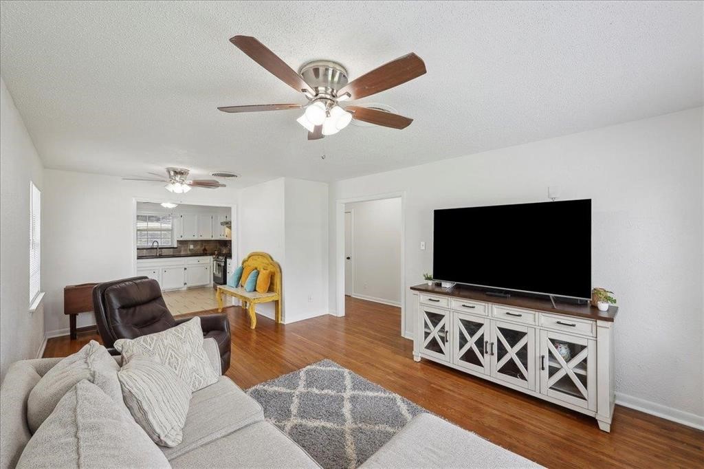 253 Hampton Lane Beaumont, TX 77707 - Photo 5 of 33 a view of living room with furniture and a flat screen tv