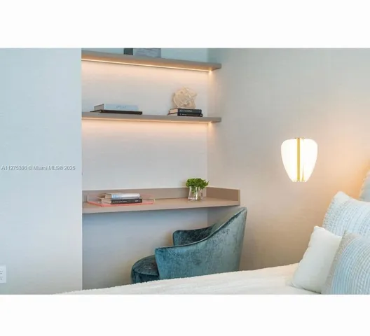 a living room with furniture and window