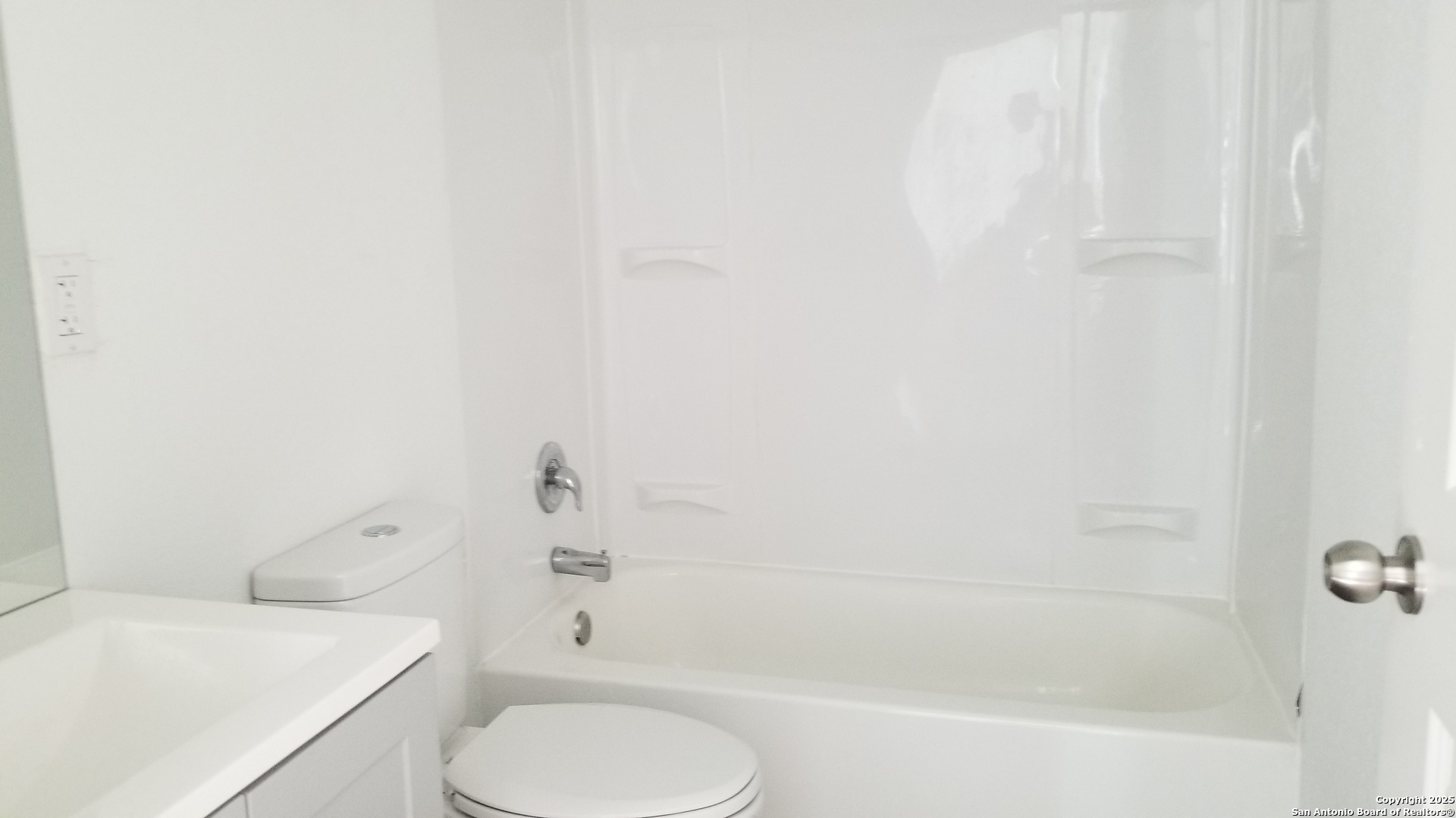 1063 Sleepy Spring Branch, TX 78070 - Photo 12 of 14 a bathroom with a toilet and a bathtub