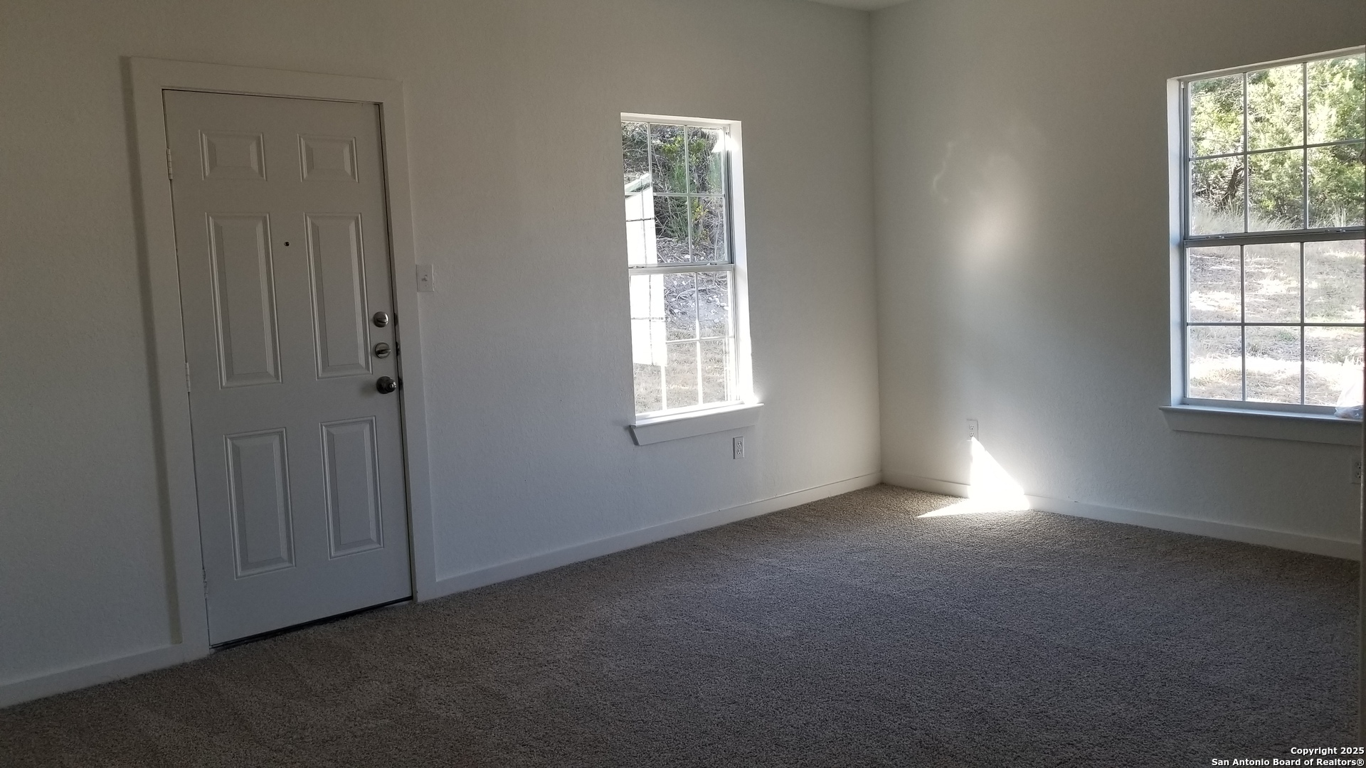 1063 Sleepy Spring Branch, TX 78070 - Photo 7 of 14 an empty room with windows