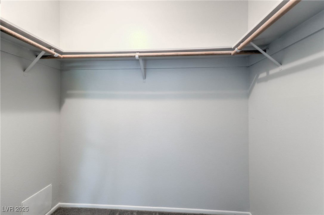 4810 Summerhill Road Las Vegas, NV 89121 - Photo 20 of 36 Primary Bedroom Walk-in Closet