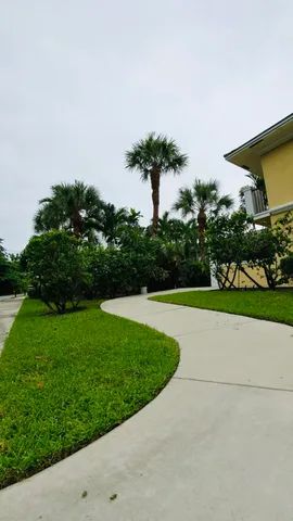 an empty room with wooden floor